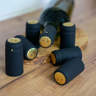 Kapturki z perforacją czarne fi31mm 100szt. – zdjęcie 2